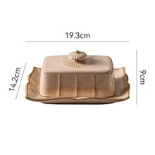 Load image into Gallery viewer, Retro-style Porcelain Butter Dish by Allthingscurated comes in 2 muted tones of Antique White and Antique Peach. A butter dish that comes with a cover with beautiful patterns, it is an ideal and practical storage for your butter. Measures 19.3cm or 7.5 inches in width, 9cm or 3.5 inches in height and 14.2cm or 5.5 inches in depth.  Featured here is the Antique Peach Butter Dish.
