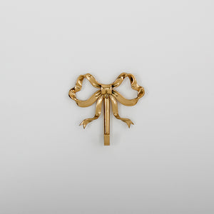 These pretty wall hooks by Allthingscurated are made of high-quality brass with a vintage gold finish.  Fashioned like a bow tied with ribbon, it’s feminine and perfect for the walk-in wardrobe or powder room. Comes in small and large size. Small hook measures 7.3cm or 2.8 inches in height and 6.5cm or 2.5 inches in width. Large hook measures 10.3cm or 4 inches in height and 9.5cm or 3.7 inches in width. Sold as individual hooks or a set of small and large hooks. This is a small hook.
