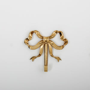 These pretty wall hooks by Allthingscurated are made of high-quality brass with a vintage gold finish.  Fashioned like a bow tied with ribbon, it’s feminine and perfect for the walk-in wardrobe or powder room. Comes in small and large size. Small hook measures 7.3cm or 2.8 inches in height and 6.5cm or 2.5 inches in width. Large hook measures 10.3cm or 4 inches in height and 9.5cm or 3.7 inches in width. Sold as individual hooks or a set of small and large hooks. This is a large hook.
