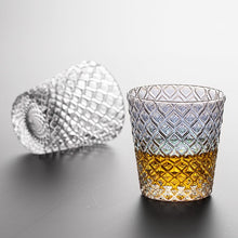 Load image into Gallery viewer, Carven geometric glass tumblers by Allthingscurated spots a unique design resembling the exterior of a pineapple.  An elegant and charming drinkware for serving cocktails, whiskey and sangria to you guests. Come available in clear or iridescent glass with height measuring 7.6cm or 3 inches by top diameter of 7.3cm or 2.8 inches and base diameter of 5.2cm or 2 inches. 
