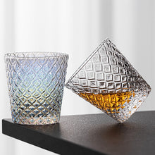 Load image into Gallery viewer, Carven geometric glass tumblers by Allthingscurated spots a unique design resembling the exterior of a pineapple.  An elegant and charming drinkware for serving cocktails, whiskey and sangria to you guests. Come available in clear or iridescent glass with height measuring 7.6cm or 3 inches by top diameter of 7.3cm or 2.8 inches and base diameter of 5.2cm or 2 inches. 
