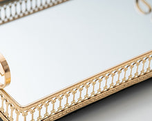 Load image into Gallery viewer, Donatella mirror tray by Allthingscurated showing off its gold-gilded intricate patterns framing the tray with gleaming mirror surface.
