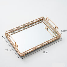Load image into Gallery viewer, Donatella Mirror tray by Allthingscurated features a mirror surface and intricate gold-gilded pattern surround all sides of the rectangle tray and with 2 handles. Available in small, medium and large size. Featured here is a large tray measuring length 37cm by width 25cm and height 8.5cm or length 14.4 inches by width 9.8 inches and height 3.3 inches.
