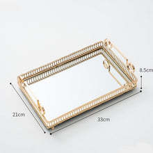 Load image into Gallery viewer, Donatella Mirror tray by Allthingscurated features a mirror surface and intricate gold-gilded pattern surround all sides of the rectangle tray and with 2 handles. Available in small, medium and large size. Featured here is a medium size tray measuring length 33cm by width 21cm and height 8.5cm or length 13 inches by width 8 inches and height 3.3 inches.
