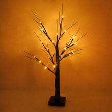 Load image into Gallery viewer, Black LED Birch Tree Light by Allthingscurated is the perfect home decor display for your beloved Halloween celebration.  Measuring 60cm or 23.4 inches in height, it comes in either 24 LED Warm White Light or 36 LED Orange Light.  The twigs are bendable and adjustable to achieve an optimal effect. Shown here is the black tree with 24 LED Warm White light.
