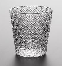 Load image into Gallery viewer, Carven geometric glass tumblers by Allthingscurated spots a unique design resembling the exterior of a pineapple.  An elegant and charming drinkware for serving cocktails, whiskey and sangria to you guests. Come available in clear or iridescent glass with height measuring 7.6cm or 3 inches by top diameter of 7.3cm or 2.8 inches and base diameter of 5.2cm or 2 inches.  This is a clear tumbler
