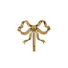 Load image into Gallery viewer, These pretty wall hooks by Allthingscurated are made of high-quality brass with a vintage gold finish.  Fashioned like a bow tied with ribbon, it’s feminine and perfect for the walk-in wardrobe or powder room. Comes in small and large size. Small hook measures 7.3cm or 2.8 inches in height and 6.5cm or 2.5 inches in width. Large hook measures 10.3cm or 4 inches in height and 9.5cm or 3.7 inches in width. Sold as individual hooks or a set of small and large hooks. This is  a small hook.
