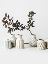 Load image into Gallery viewer, Kiara Stoneware Vases by Allthingscurated is a collection of small ceramic vases with a rustic beauty. Comes in various shapes and sizes with beautiful details and etched patterns. Off-white in color in 5 designs.

