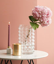 Load image into Gallery viewer, Zayla Bubble Vase by Allthingscurated features a geometric bubble design. The eye-catching detail and design are enough to make it a statement centerpiece with or without floral display. Comes in black or clear and in 2 sizes. The short vase measures 17cm or 6.6 inches in height and 16cm or 6.2 inches in diameter.  The tall vase measures 27.5cm or 10.7 inches in height and 13cm or 5 inches in diameter. This is a tall clear vase with a sprig of pink hydrangea.
