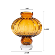 Load image into Gallery viewer, Luna Lantern Vase in Amber by Allthingscurated in small size. Measuring 24cm or 9.4 inches in height and 20cm or 7.8 inches in width. Top opening measures 7cm or 2.7 inches.
