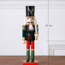 Load image into Gallery viewer, Christmas Nutcracker Toy Solder Guard in black uniform and holding a sword in his left hand.  Standing at 30.5cm or 12 inches.
