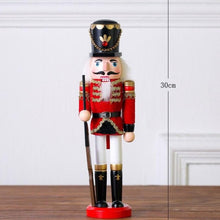 Load image into Gallery viewer, Christmas Nutcracker Toy Soldier Guard wearing  Red Uniform holding a rifle in his right hand. Standing at 30cm or 11.7 inches.
