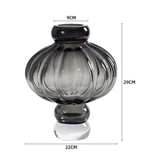 Luna Lantern Vase in Gray by Allthingscurated in large size. Measuring 29cm or 11.3 inches in height and 22cm or 8.6 inches in width. Top opening measures 9cm or 3.5 inches.