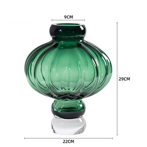 Luna Lantern Vase in Green by Allthingscurated in large size. Measuring 29cm or 11.3 inches in height and 22cm or 8.6 inches in width. Top opening measures 9cm or 3.5 inches.