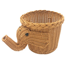 Load image into Gallery viewer, Allthingscurated elephant shape rattan basket in dark caramel color. Measuring height 16cm, diameter 20cm and width 30cm.  Ideal as a storage basket or as a pot holder for your houseplant.
