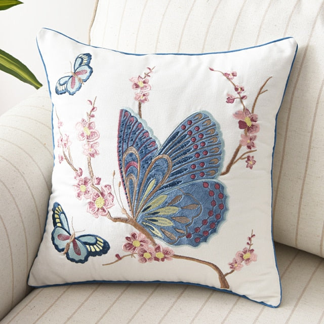 Allthingscurated Spring Harmony Cushion Cover Collection in garden-inspired theme featuring butterflies, florals and birds in embroidering in 100% cotton fabric. Measuring 45 x 45cm or 18 x 18 inches. Available in 7 designs. Shown here, butterflies in blue and mauve Design C.