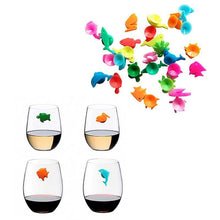 Load image into Gallery viewer, A set of 12 wine glass charms shaped like marina animals in bright random colors. They are made of silicon and feature suction cups. 
