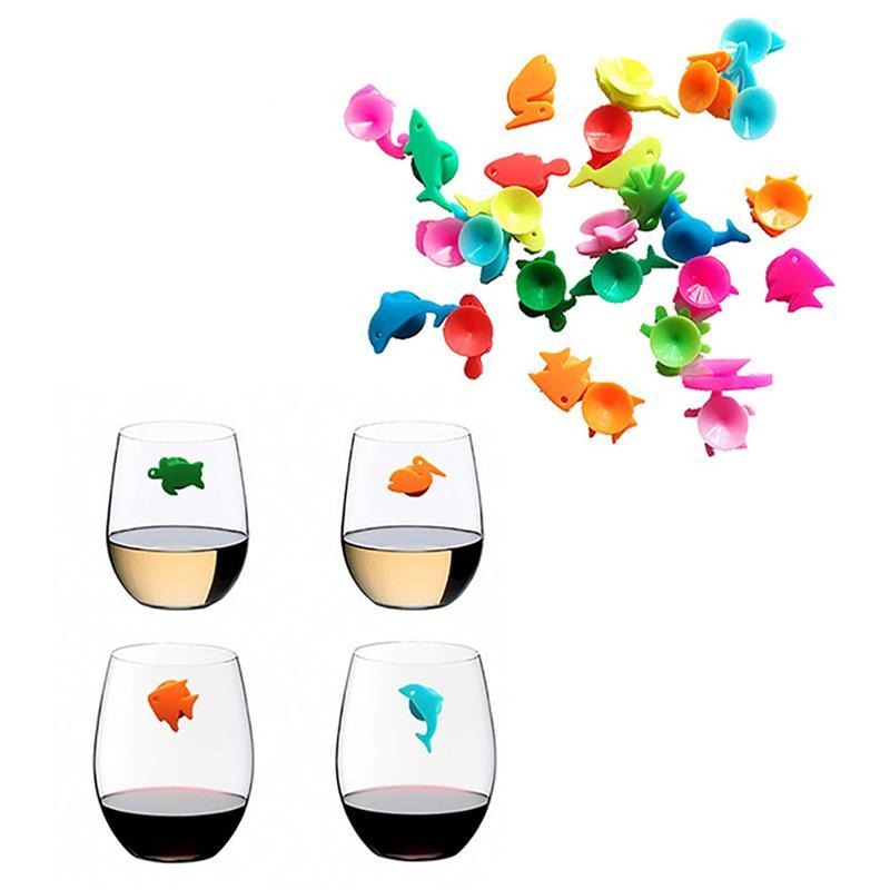 A set of 12 wine glass charms shaped like marina animals in bright random colors. They are made of silicon and feature suction cups. 