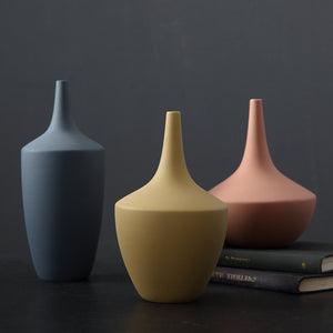 Morandi decorative vases in milky blue, blushing peach and honey milk by Allthingscurated.