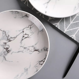 Modern ceramic plates with a marble design by Allthingscurated. These timeless and elegant plates come in 6, 8 or 10 inches.