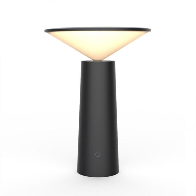 Cordless and portable bar table lamp in minimalist design, with black body. Dimmable with 3 lighting modes from warm, to white and natural light. Fully charged in 4 hours with USB cable.