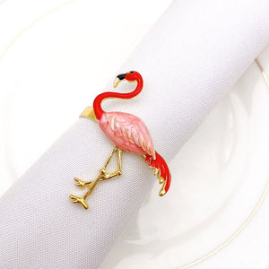 Allthingscurated Flamingo Napkin Rings in a set of 6. Crafted from aluminum alloy and enamel in Coral. Measuring H5.2cm by W4.1cm or H2 inch x W1.6 inch.